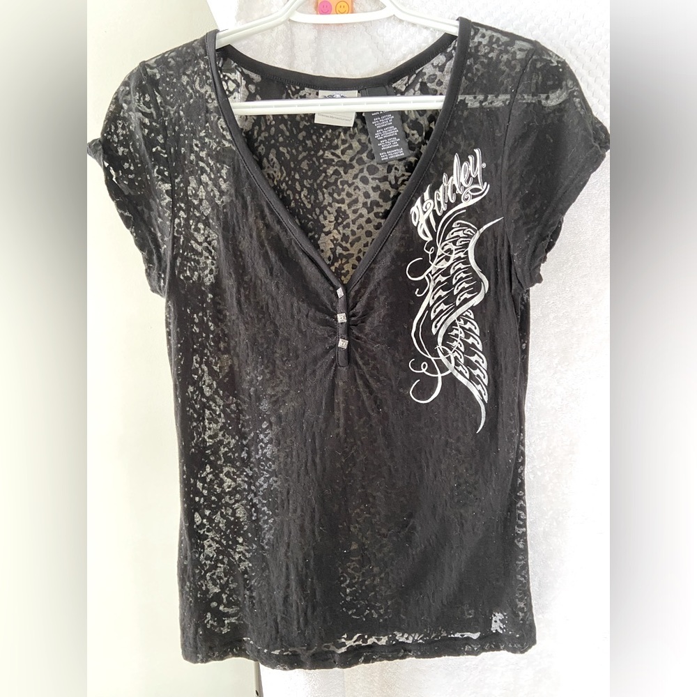 Harley Davidson- Women’s Black See-Through, V-neck with Wings on the back.